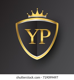 Initial logo letter YP with shield and crown Icon golden color isolated on black background, logotype design for company identity.