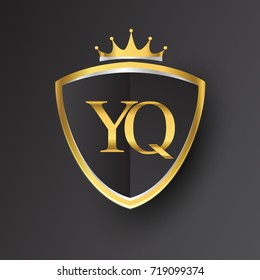 Initial logo letter YQ with shield and crown Icon golden color isolated on black background, logotype design for company identity.