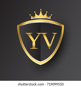 Initial logo letter YV with shield and crown Icon golden color isolated on black background, logotype design for company identity.