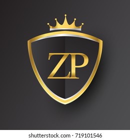 Initial logo letter ZP with shield and crown Icon golden color isolated on black background, logotype design for company identity.