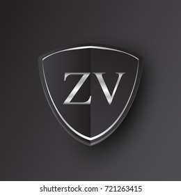 Initial logo letter ZV with shield Icon silver color isolated on black background, logotype design for company identity.