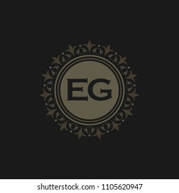 EG initial logo. Luxury ornament crown logo.