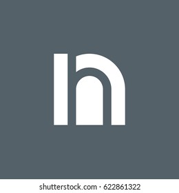 initial logo nh, hn, h inside n rounded letter negative space logo white gray background