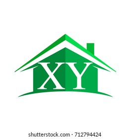 initial logo XY with house icon and green color, business logo and property developer.