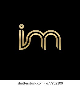 Initial lowercase letter im, linked outline rounded logo, elegant golden color on black background