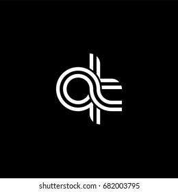 Initial lowercase letter qt, linked outline rounded logo, white color on black background