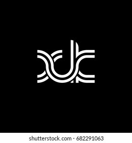 Initial lowercase letter xk, linked outline rounded logo, white color on black background