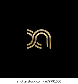 Initial lowercase letter xn, linked outline rounded logo, elegant golden color on black background
