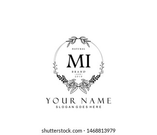 Initial MI beauty monogram and elegant logo design, handwriting logo of initial signature, wedding, fashion, floral and botanical with creative template.