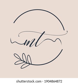 Initial MT logo Handwriting floral and botanical vector