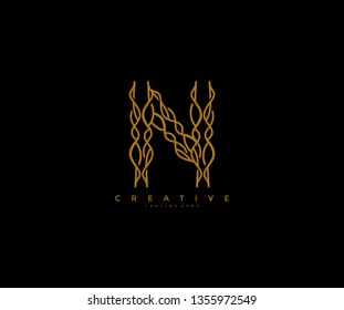 Initial N Letter Elegant Wavy Branch Monogram Logo