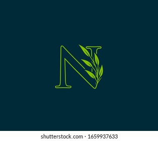 Initial N letter with green leaves logo