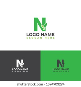 Initial N letter leaves with water droplets. Minimalist and modern cannabis leaf design