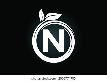 Initial N monogram letter alphabet in a spiral with green leaves. Font emblem. Nature icon sign symbol. Modern vector logo design for business healthcare, nature, farm, and company identity.