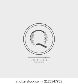 Initial Q letter luxury beauty flourishes ornament monogram logo