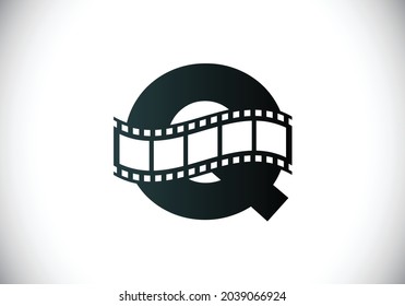 Initial Q monogram alphabet incorporated with film reel. Video and movie logo concept. Font emblem. Logo for the entertainment business and company identity