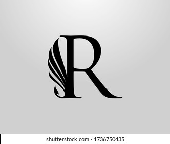 Initial R Classic Wing Logo. Heraldic R Letter Design Vector with Wing and Tale Shape Design.