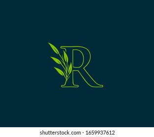 Initial R letter with green leaves logo