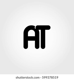 initial a and t black business logo