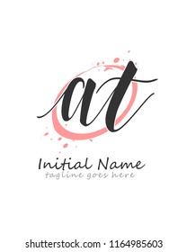 Initial A T handwriting logo with circle vector template