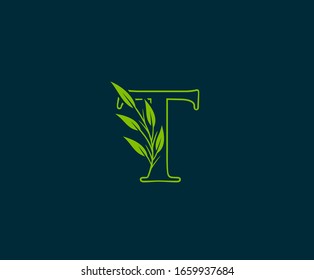 Initial T letter with green leaves logo