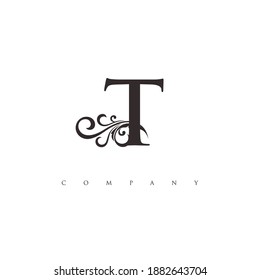 initial T logo with ornament

