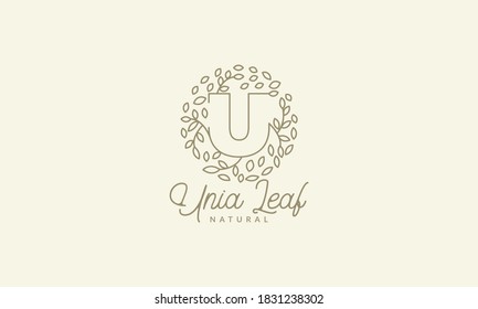U inicial o letra U con ornamento de hoja en círculo lujo moderno logo vectorial diseño de icono 