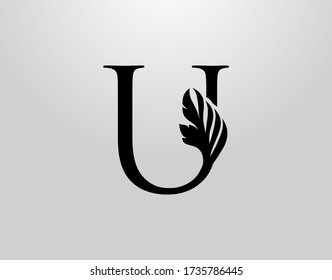 Logo Inicial De Swirl. Vector de diseño de letras U clásicas con color negro y mano floral dibujada.