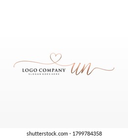 Initial UN beauty monogram and elegant logo design, handwriting logo of initial signature, wedding, fashion, floral and botanical with creative template.