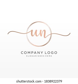 Initial UN beauty monogram and elegant logo design, handwriting logo of initial signature, wedding, fashion, floral and botanical with creative template.