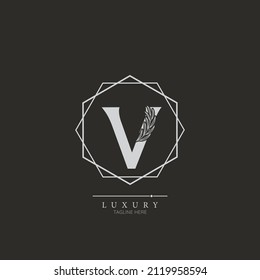 Initial V letter luxury beauty flourishes ornament monogram logo
