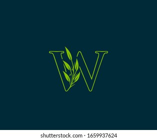 Initial W letter with green leaves logo