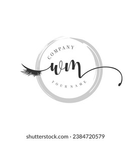 Initial WM monogram eye and eyelash handwriting