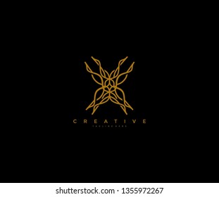 Initial X Letter Elegant Wavy Branch Monogram Logo