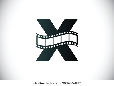 Initial X monogram alphabet incorporated with film reel. Video and movie logo concept. Font emblem. Logo for the entertainment business and company identity