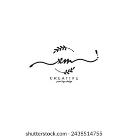 Tipografía inicial de la marca botánica del logotipo de XM