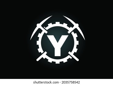 Initial Y monogram letter alphabet with pickaxe and gear sign. Mining logo design concept. Modern vector logo for mining business and company identity.