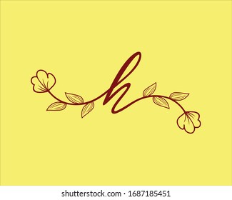 iniciales h con el logo floral