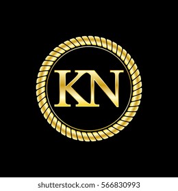 initials k and n logo luxurious golden letters with gold rope