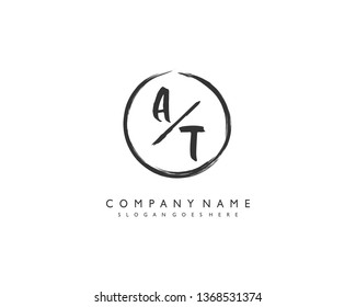 initials letter AT handwriting logo vector template