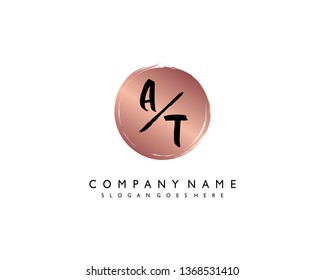 initials letter AT handwriting logo vector template