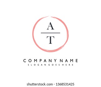 initials letter AT handwriting logo vector template