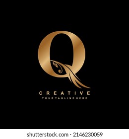initials letter Q luxury beauty monogram logo gold color. typography logo