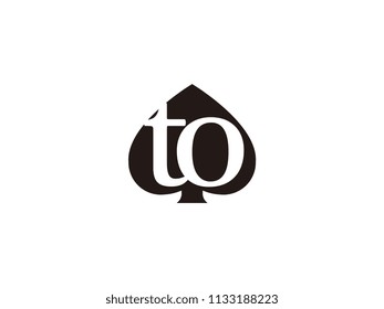 The to initials logo inside the black shovel