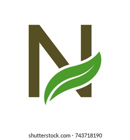 initials logo letters with the leaves