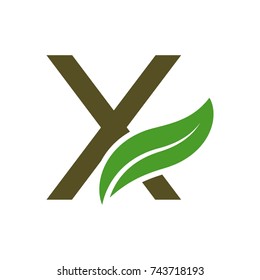 initials logo letters with the leaves