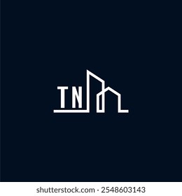 Un logotipo elegante y moderno muestra Formas arquitectónicas abstractas, enfatizando la creatividad y la innovación en el diseño de edificios contra una oscuridad