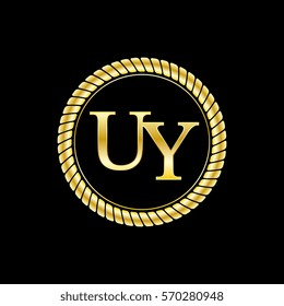 initials u and y logo luxurious golden letters with gold rope
