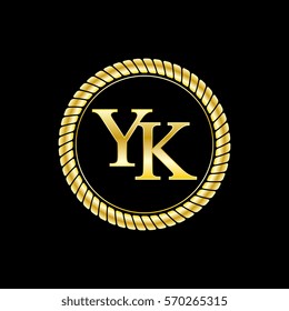 initials y and k logo luxurious golden letters with gold rope