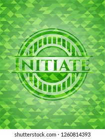Initiate green emblem with triangle mosaic background